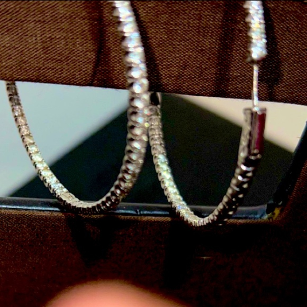 Huge platinum white gold diamond in/out hoops for sale. Purchased 15 years ago.